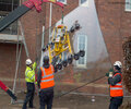 DSL2 and UNIC mini crane installing curved window