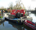URW-706 being transported on a pontoon